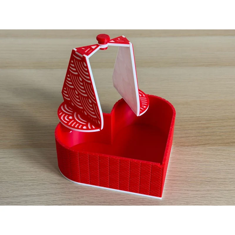 Boîte en forme de cœur avec couvercle origami pliable