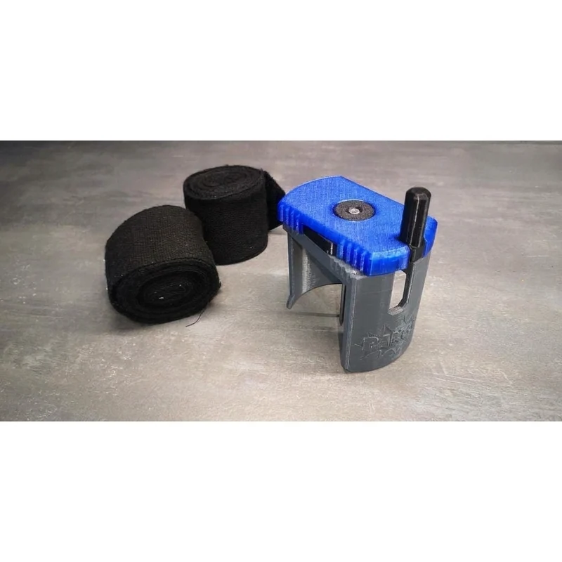 Enrouleur à engrenages pour bandes de boxe et bandages