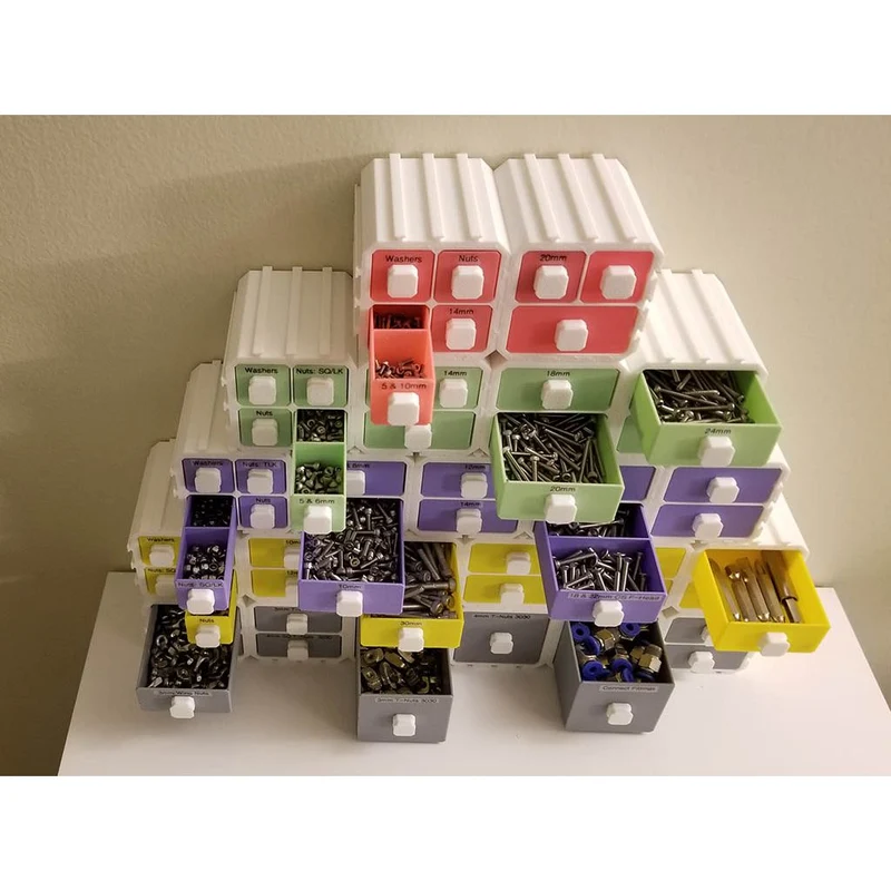 Système de tiroirs modulaires pour le rangement de petites pièces