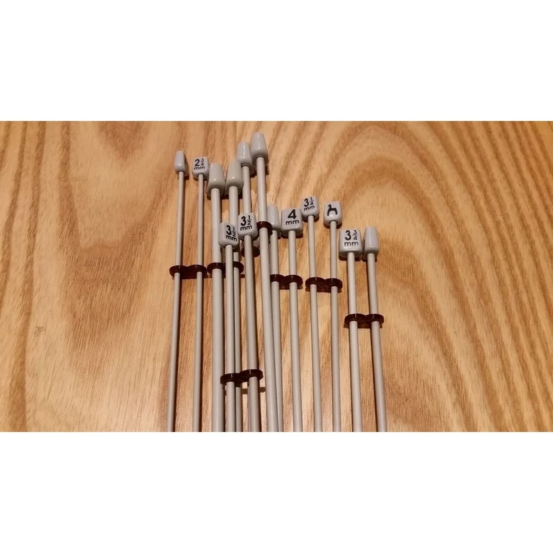 Support pratique pour l'organisation des aiguilles à tricoter