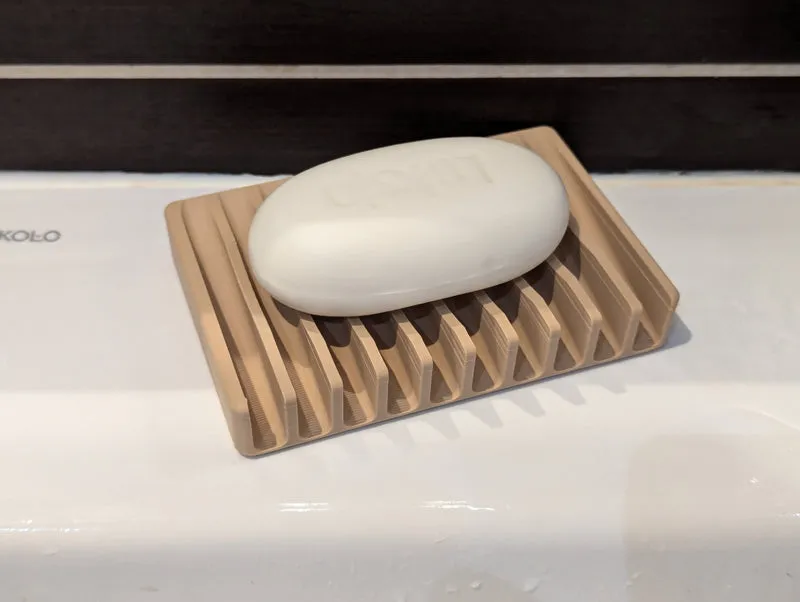Porte-savon auto-drainant pour salle de bain et lavabo