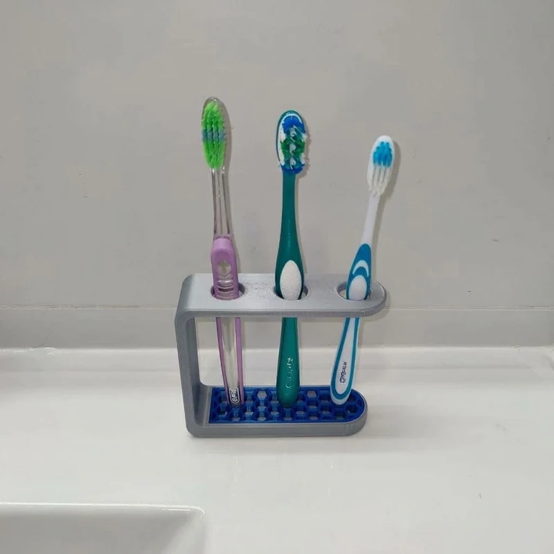 Support fonctionnel pour brosses à dents et dentifrice