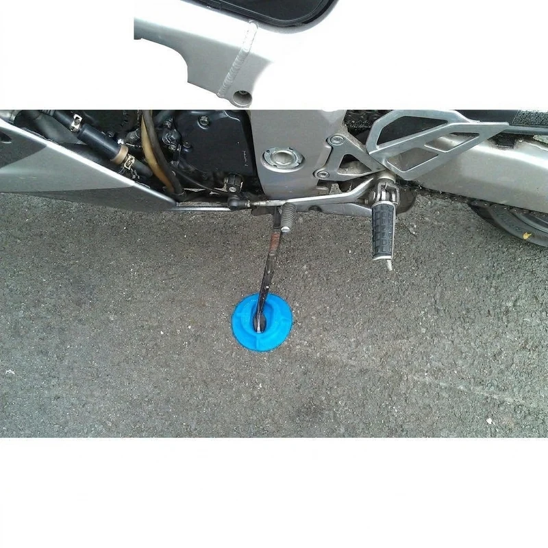 Plaque de support pour moto pour un stationnement stable
