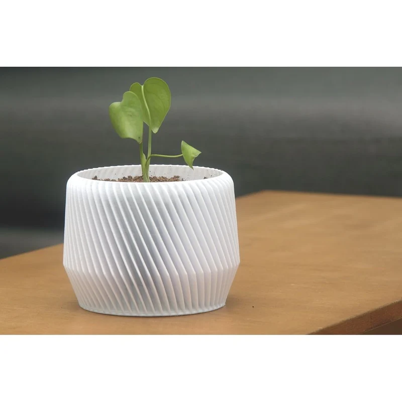 Cache-pot en spirale géométrique pour plantes d'intérieur