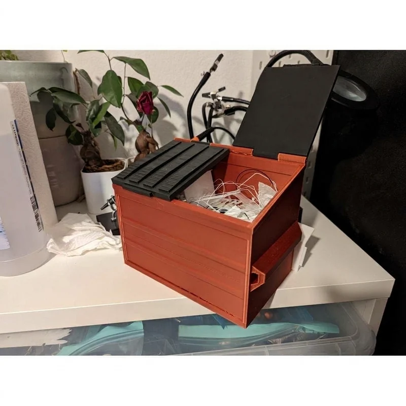 Conteneur à déchets compact pour les surplus d'impression 3D