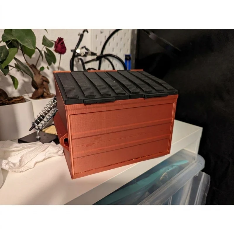 Conteneur à déchets compact pour les surplus d'impression 3D