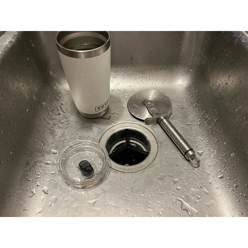 Grille de protection pour évier de cuisine avec broyeur d'éboueurs intégré