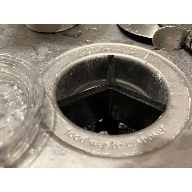 Grille de protection pour évier de cuisine avec broyeur d'éboueurs intégré