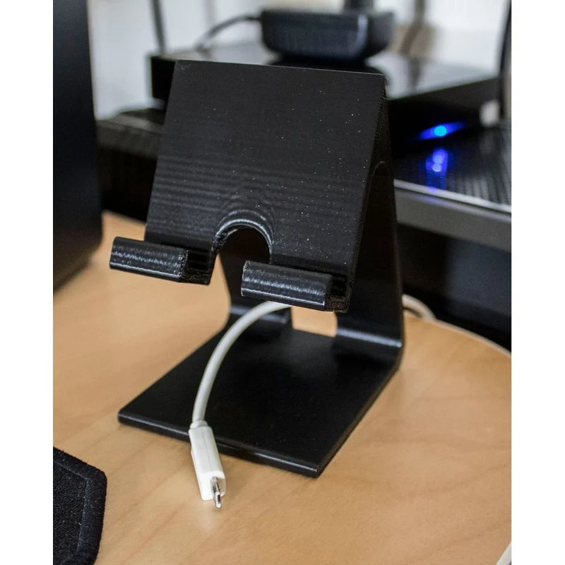 Support de téléphone avec espace pour le câble de charge