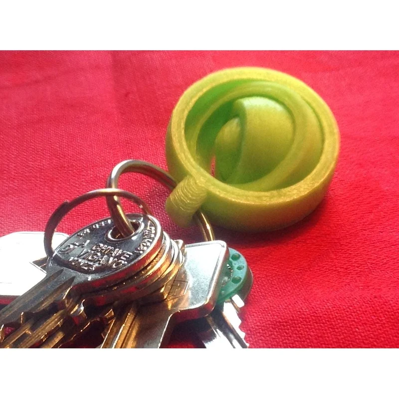 Porte-clés gyroscopique avec anneaux fidget rotatifs