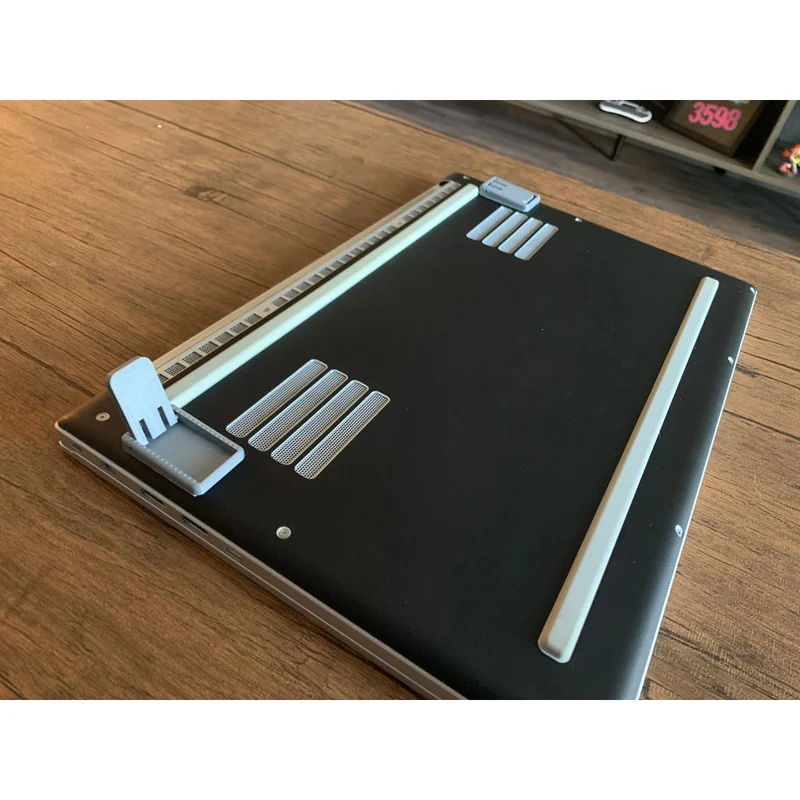 Support d'ordinateur portable ergonomique pour un meilleur confort d'écriture