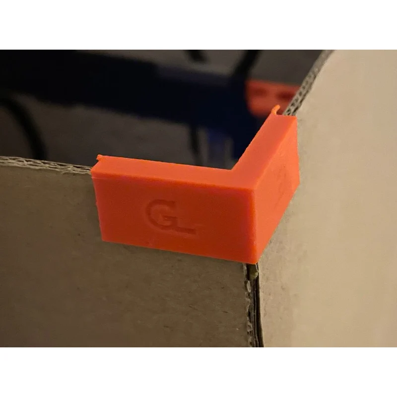 Renforts d'angle pour caisses en carton ondulé