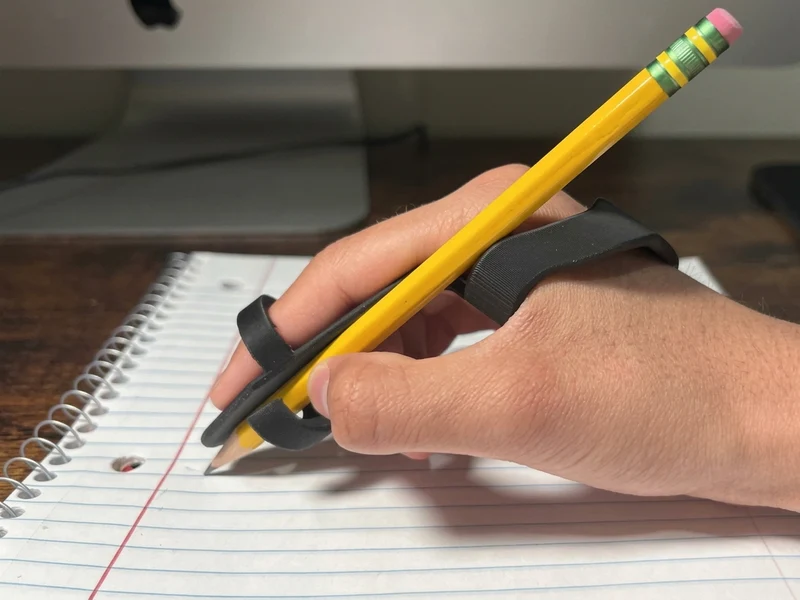 SquiggleAide aide à l'écriture ergonomique pour force de préhension réduite