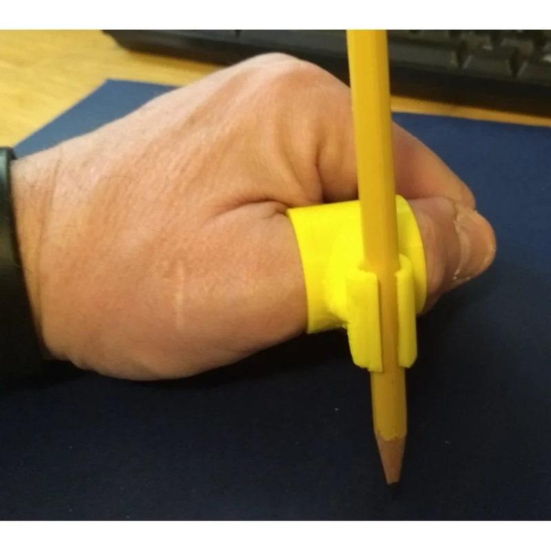 Porte-stylo ergonomique en forme d'anneau comme aide pratique