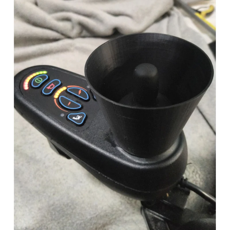 Bouclier de protection pour joystick de fauteuil roulant électrique