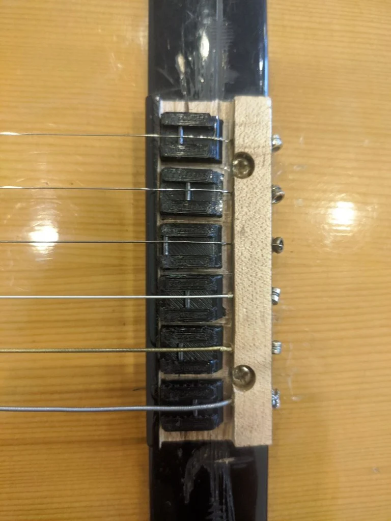 Selle réglable pour guitare acoustique/classique