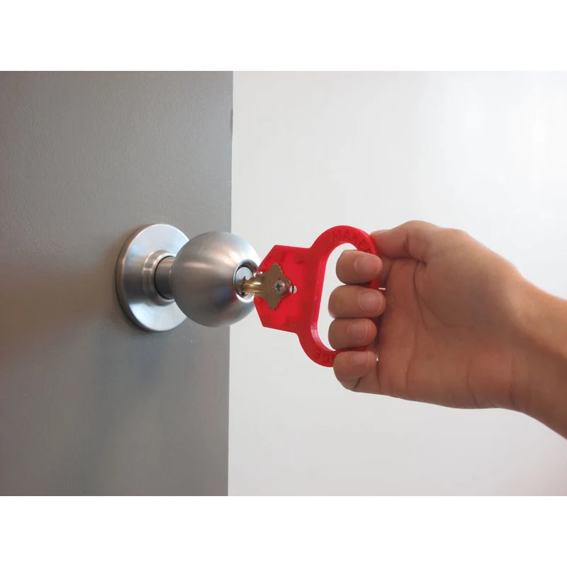 Tourne-clé ergonomique pour une utilisation facile des clés