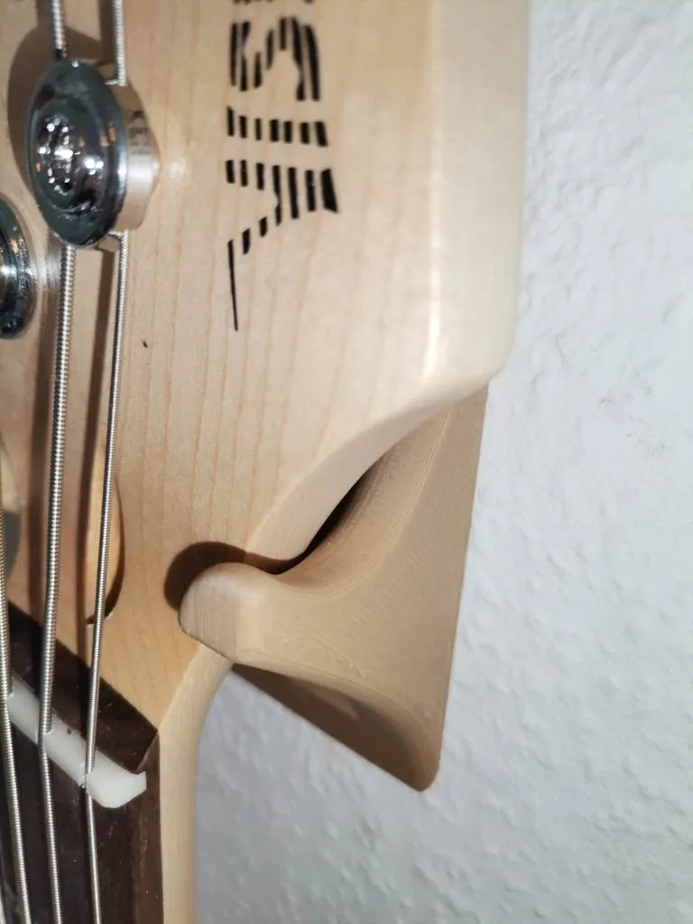 Support mural pour basse et guitare