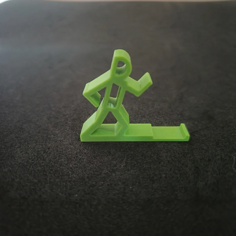 Support de téléphone en forme de coureur