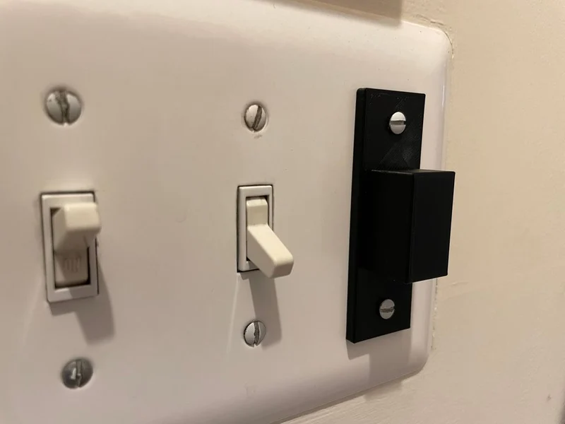 Protection pour interrupteurs à bascule