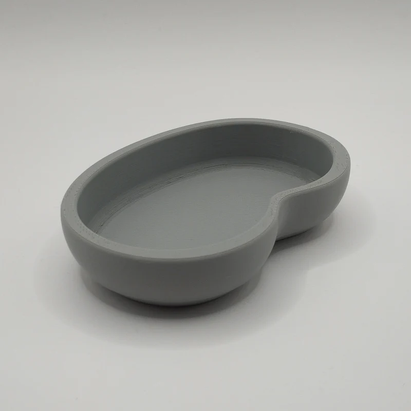 Vide-poche moderne en forme de haricot pour clés et pièces
