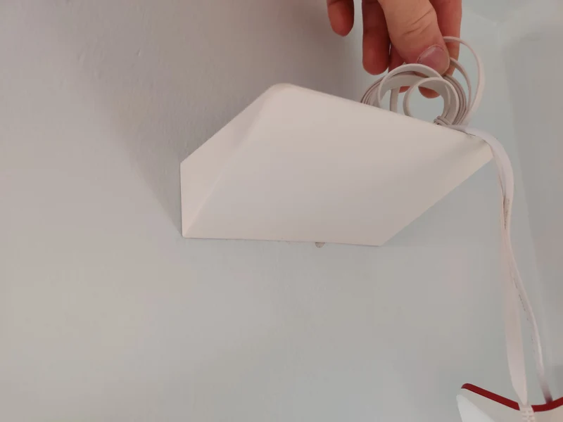 Support mural Fritz Repeater 3000 avec range-câbles intégré