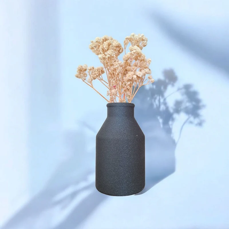 Pot en demi-lune décoratif et vase assorti