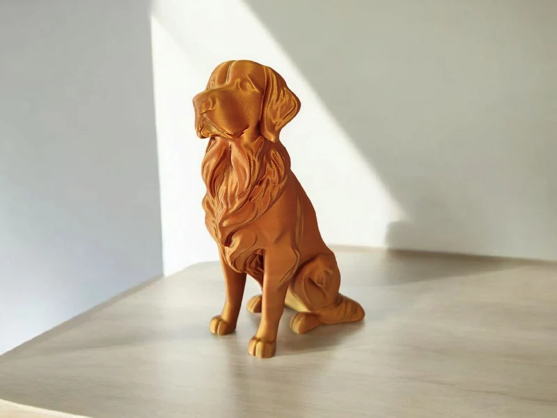 Élégante sculpture de Golden Retriever aspect bronze