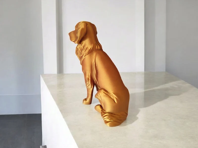 Élégante sculpture de Golden Retriever aspect bronze
