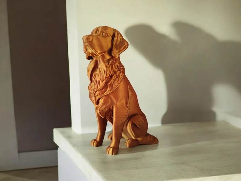 Élégante sculpture de Golden Retriever aspect bronze