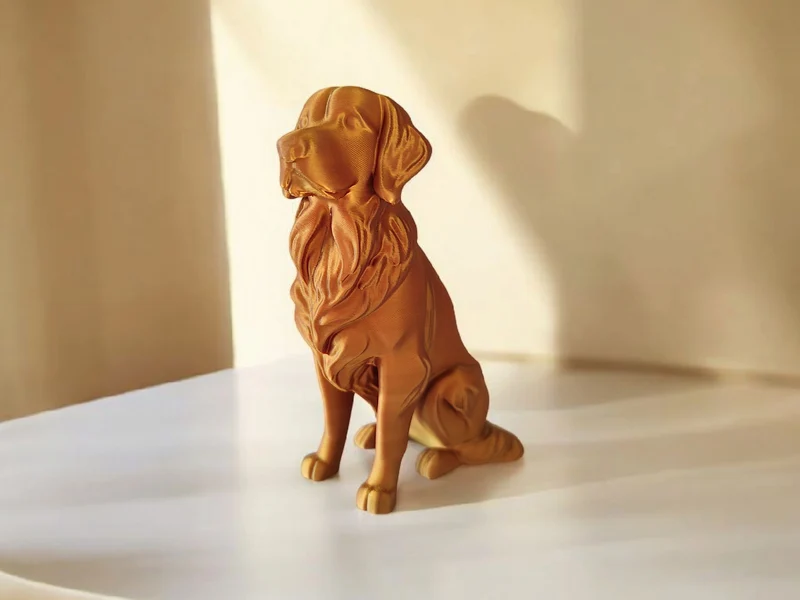 Élégante sculpture de Golden Retriever aspect bronze