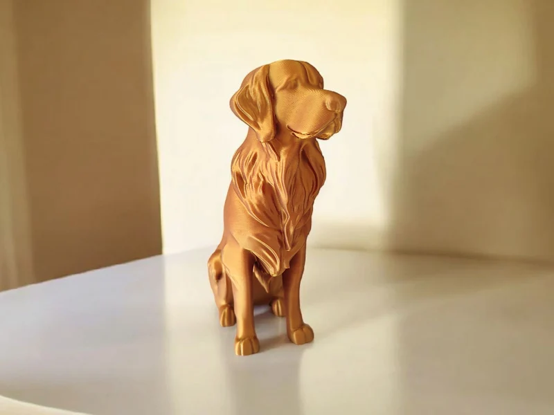 Élégante sculpture de Golden Retriever aspect bronze