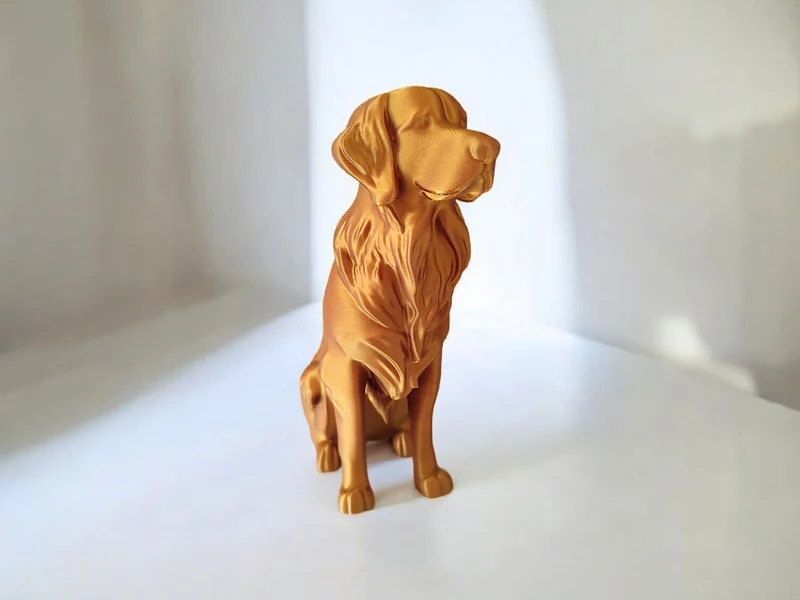 Élégante sculpture de Golden Retriever aspect bronze