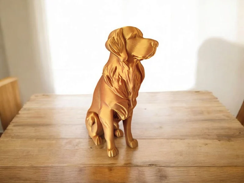 Élégante sculpture de Golden Retriever aspect bronze