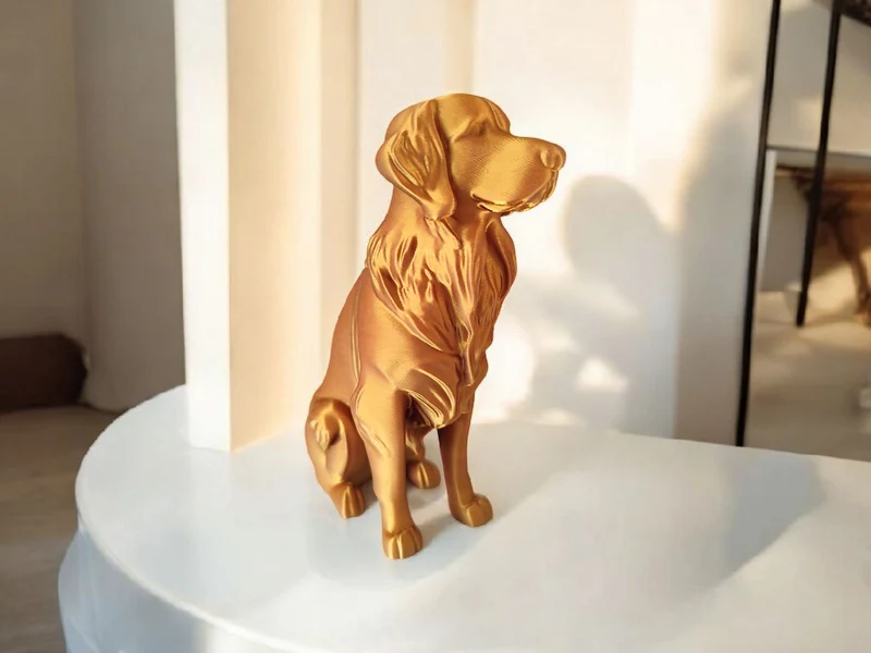 Élégante sculpture de Golden Retriever aspect bronze
