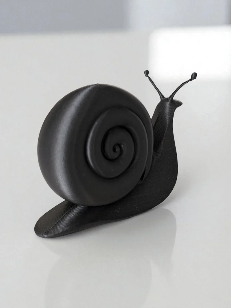 Sculpture d'escargot minimaliste pour un intérieur moderne