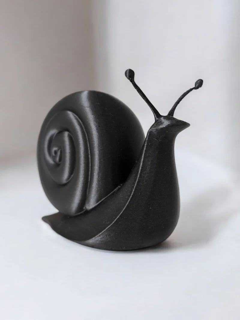 Sculpture d'escargot minimaliste pour un intérieur moderne