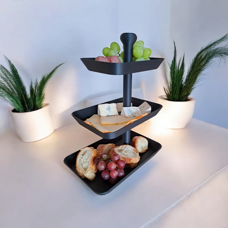 Présentoir à trois niveaux pour snacks
