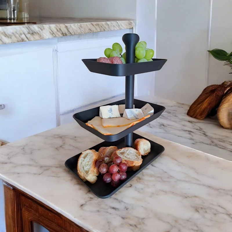 Présentoir à trois niveaux pour snacks