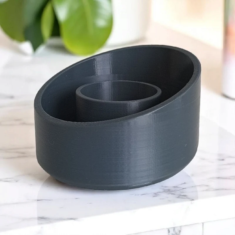 Bougeoir moderne en forme d'ellipse avec bord incliné