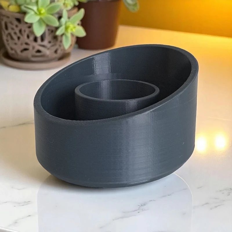 Bougeoir moderne en forme d'ellipse avec bord incliné