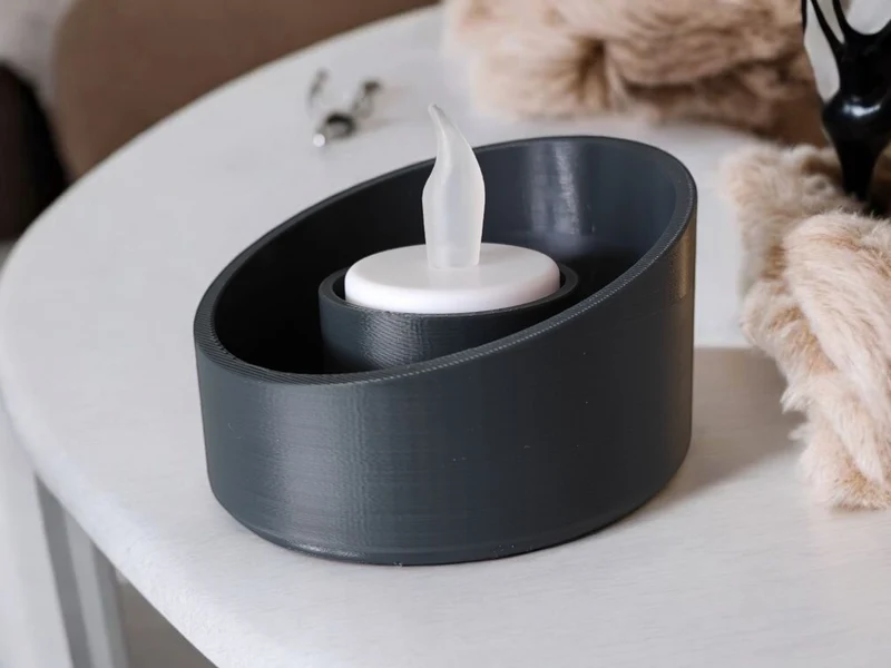 Bougeoir moderne en forme d'ellipse avec bord incliné