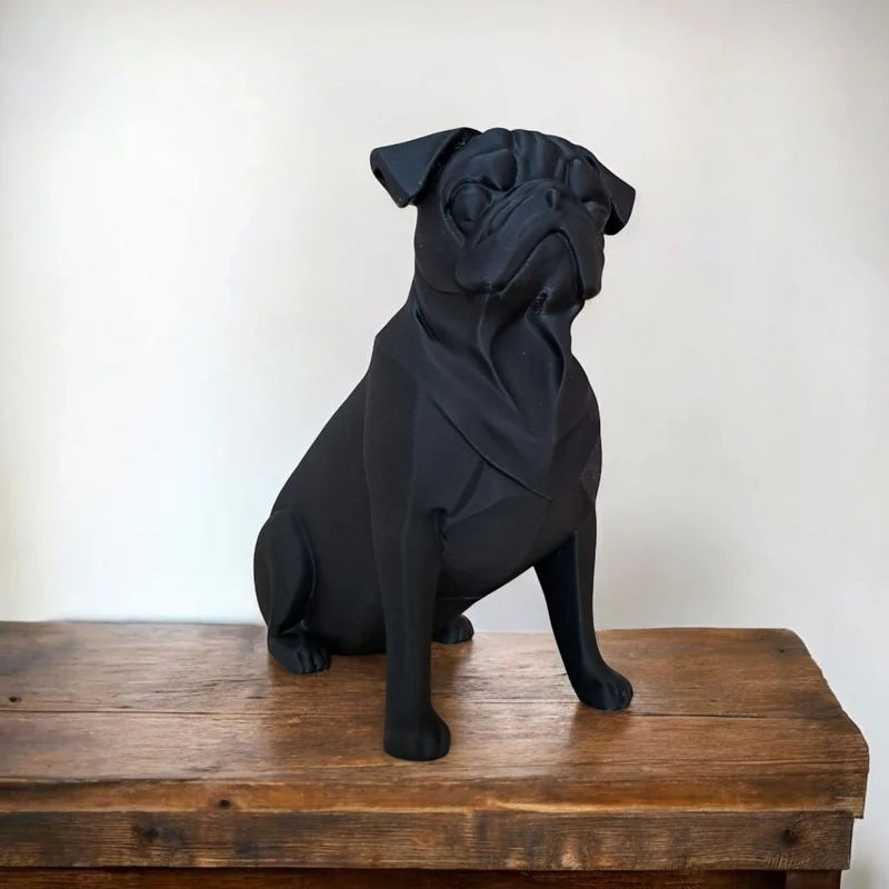 Sculpture minimaliste noire d'un carlin