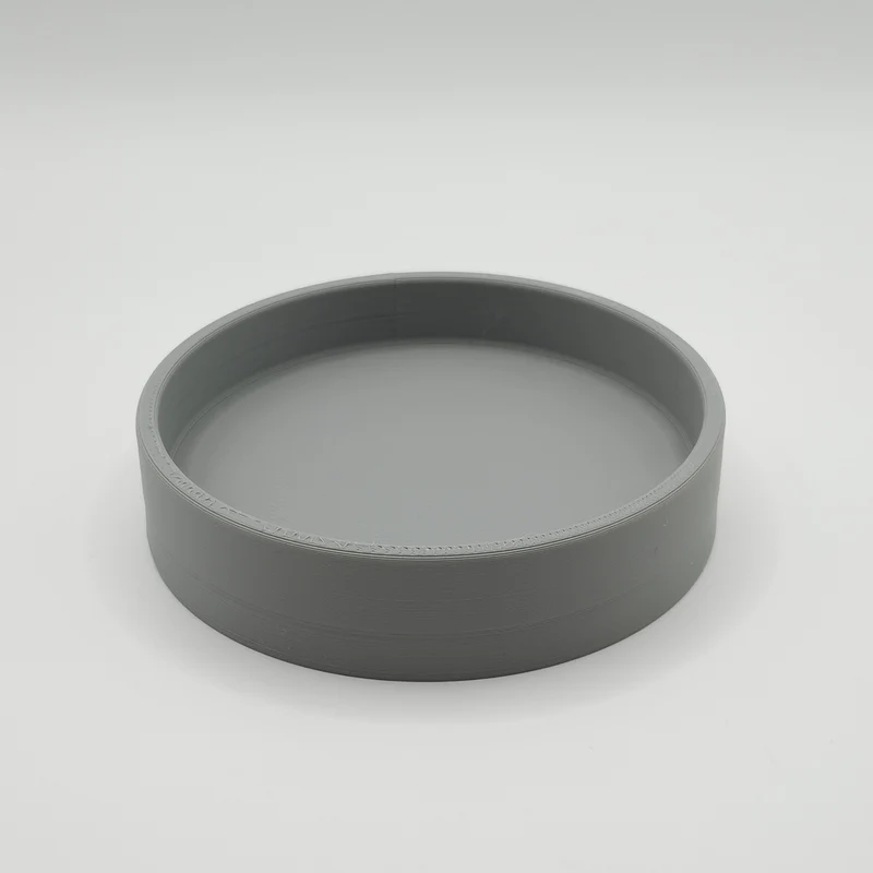 Plateau à clés rond minimaliste pour un rangement pratique