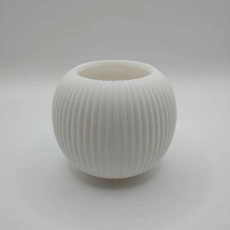 Pot de fleurs rond moderne avec design côtelé