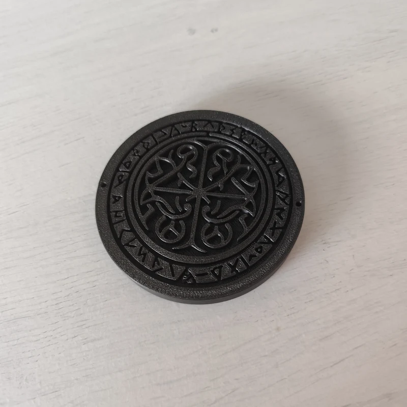 Sous-verre d'inspiration celtique avec des runes