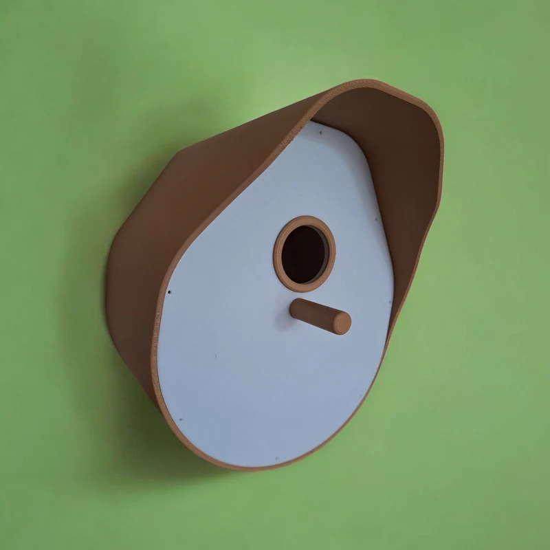 Nichoir moderne incurvé avec toit en forme de cloche