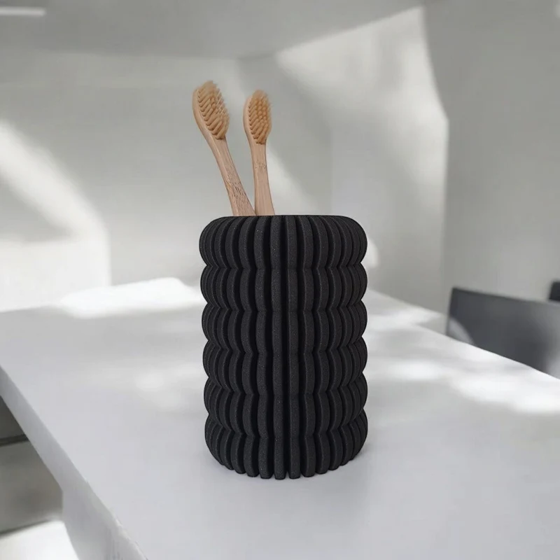 Support Ribbet pour brosses à dents et articles de papeterie