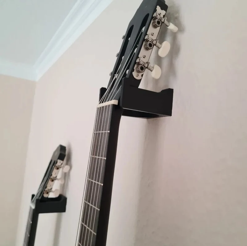Support mural stable et discret pour guitare