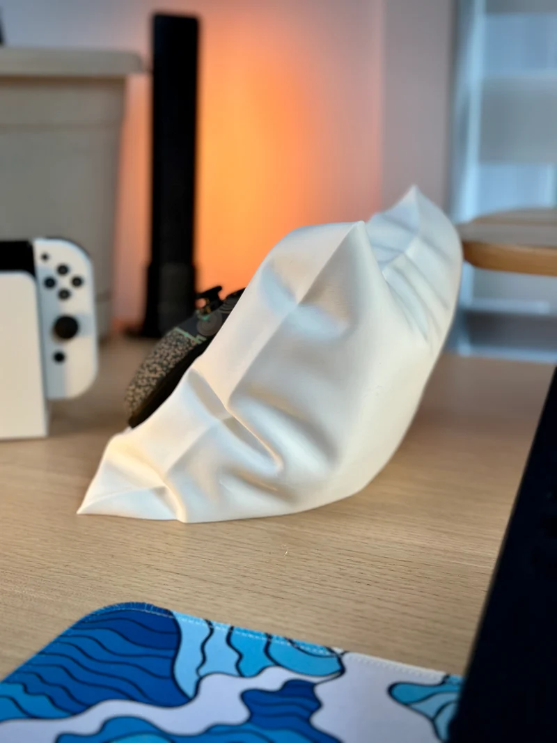 Support en forme de coussin pour manettes Xbox et Switch